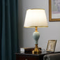 Traditional Chinese Brass Ceramic Fabric Round Fan-Shaped 1-Light Table Lamp For Bedroom