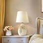 Contemporary Nordic Ceramic Fabric Floral Column 1-Light Table Lamp For Bedroom And Living Room