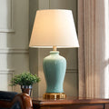 Contemporary Nordic Ceramic Fabric Elliptical Base 1-Light Table Lamp For Bedroom And Living Room