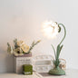 Contemporary Scandinavian Floral Disc Base Iron Acrylic 1-Light Table Lamp For Bedroom