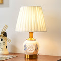 Traditional Chinese Round Table Ball Flower Hollowed Metal Ceramic Fabric 1-Light Table Lamp For Bedroom