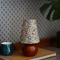 Traditional Vintage Crushed Flower Round Column Solid Wood PVC Fabric 1-Light Table Lamp For Bedroom