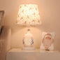 Contemporary Nordic Ceramic Fabric Cylinder Flower Skeleton Pattern 1-Light Table Lamp For Bedside