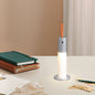 Modern Minimalist Portable Carrying Cord Cylinder Aluminum Acrylic LED Table Lamp For Bedroom